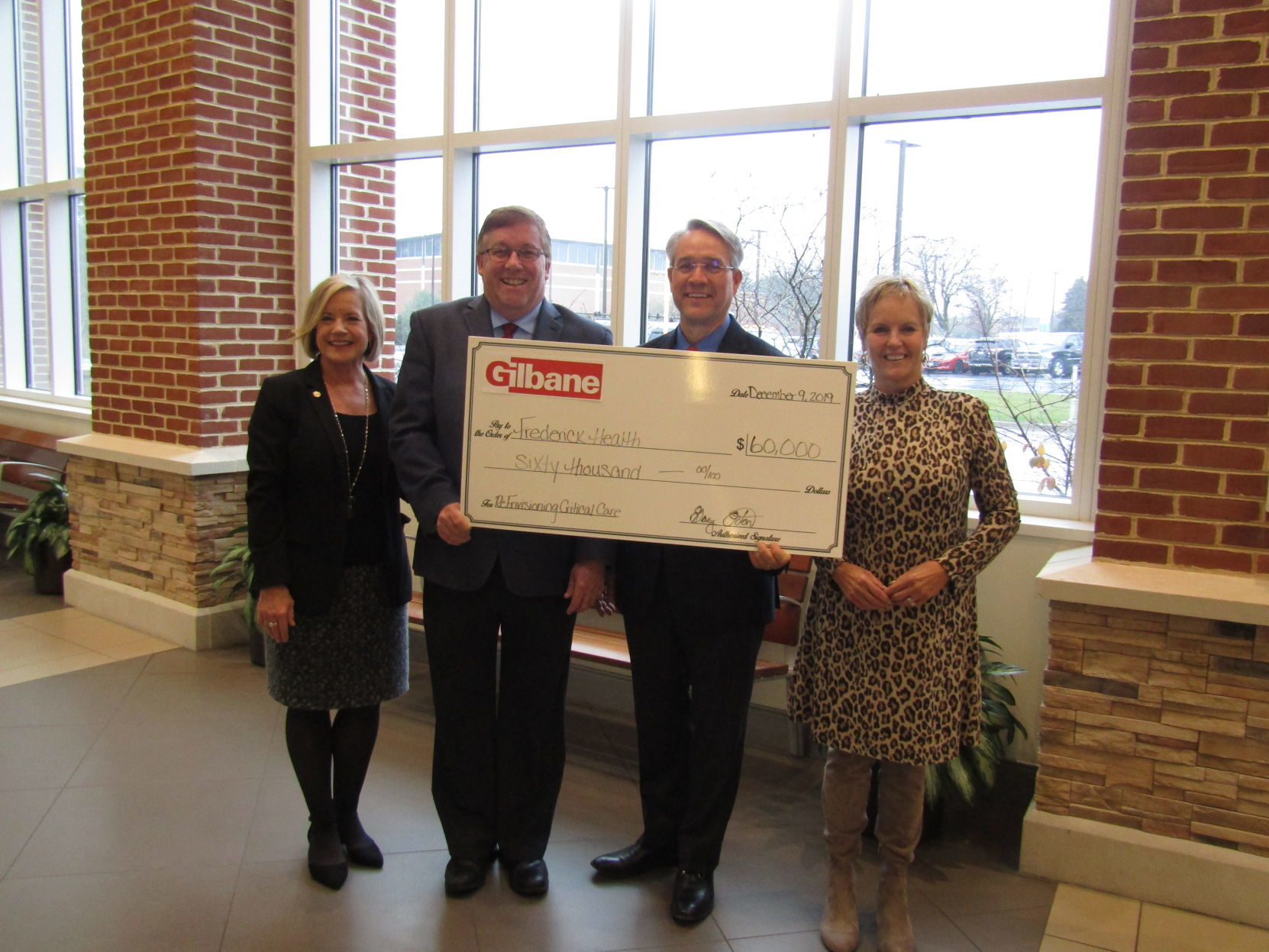 Gilbane Building Co. donation to FHH Corporate Honor Roll